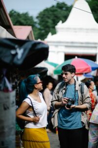 Close up of Tourists Meeting on a Street