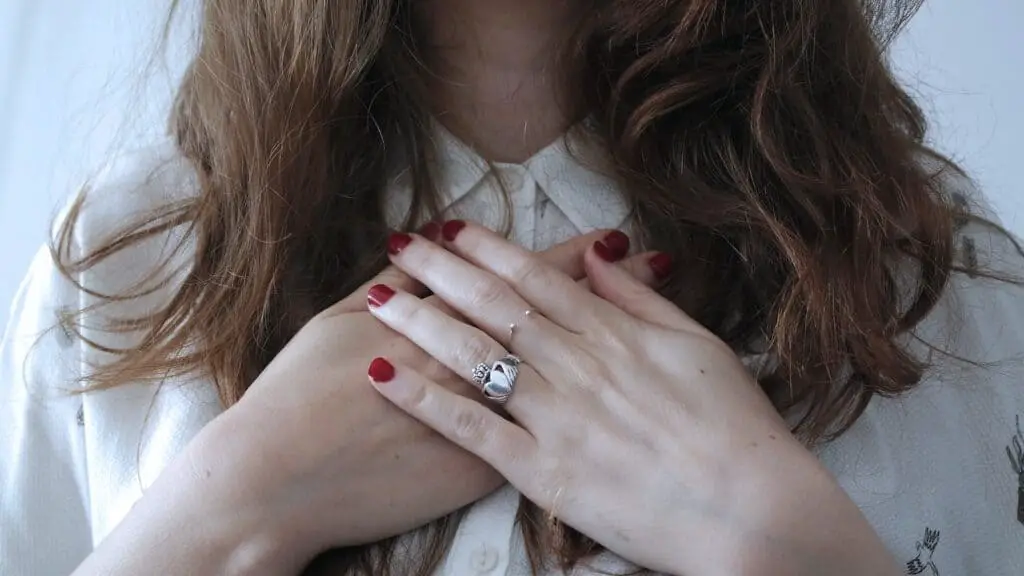 woman wearing silver-colored ring, self love