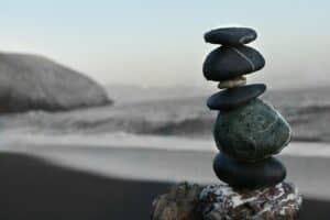 a stack of six black rocks