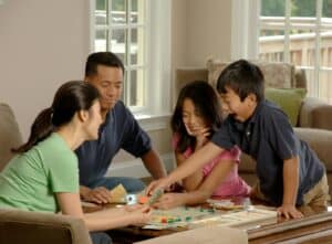 a family playing board game