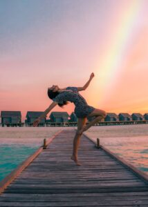 woman dancing on dock